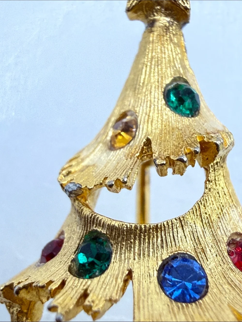 Vintage JJ Gold-tone Christmas Tree Pin with Multicolored Rhinestones